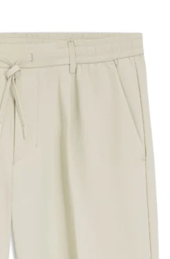Active tapered-fit trousers in water-repellent stretch fabric