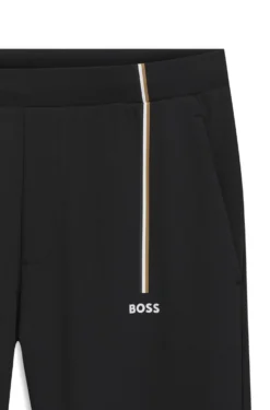 Active tracksuit bottoms in thermoregulating stretch gabardine