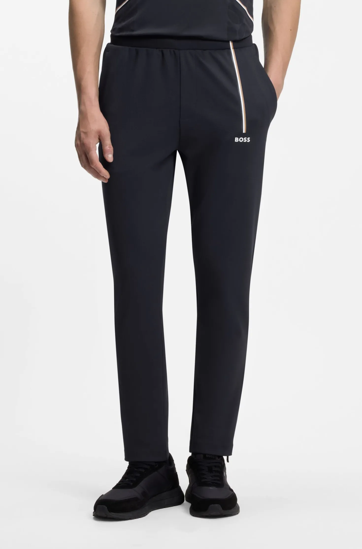 Active tracksuit bottoms in thermoregulating stretch gabardine