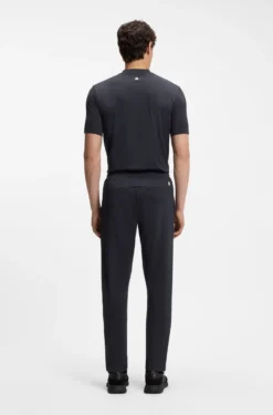 Active tracksuit bottoms in thermoregulating stretch gabardine