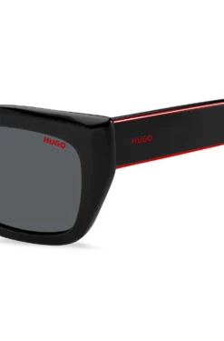 Black-acetate sunglasses with signature-red layered temples