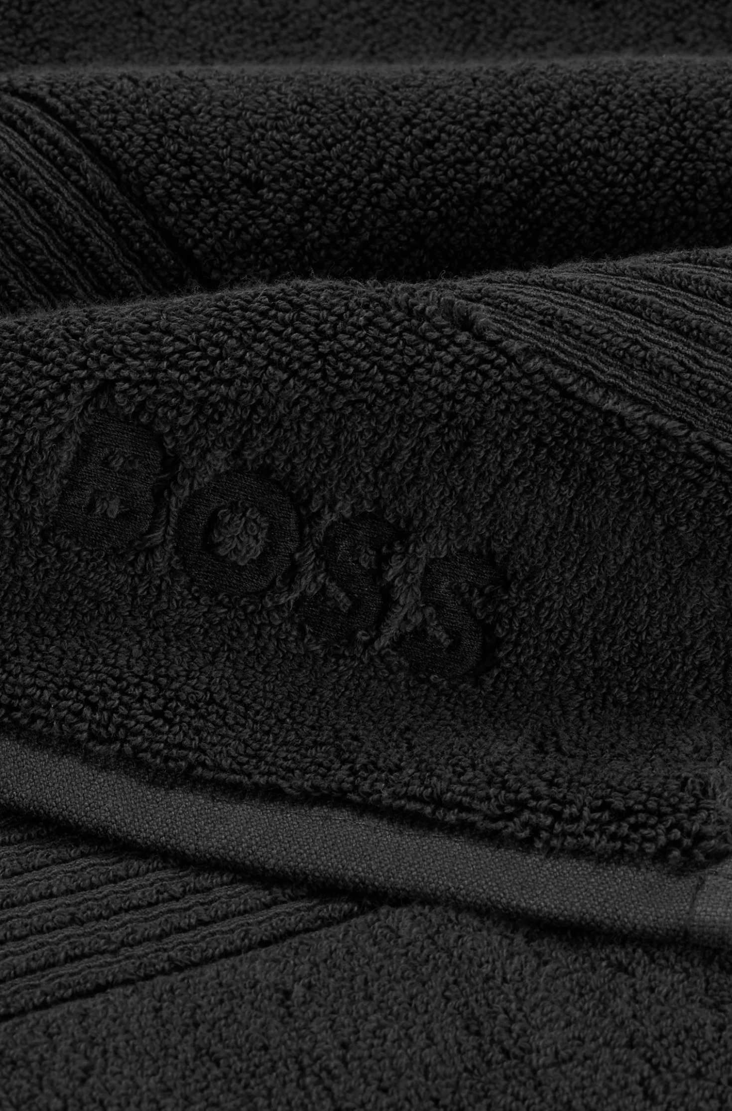 Black cotton bath sheet with tonal embroidered logo