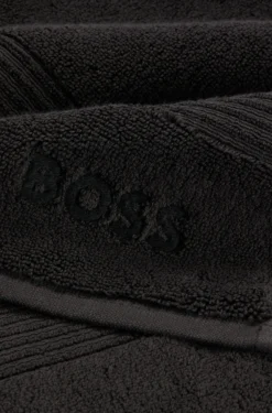 Black cotton bath towel with embroidered logo