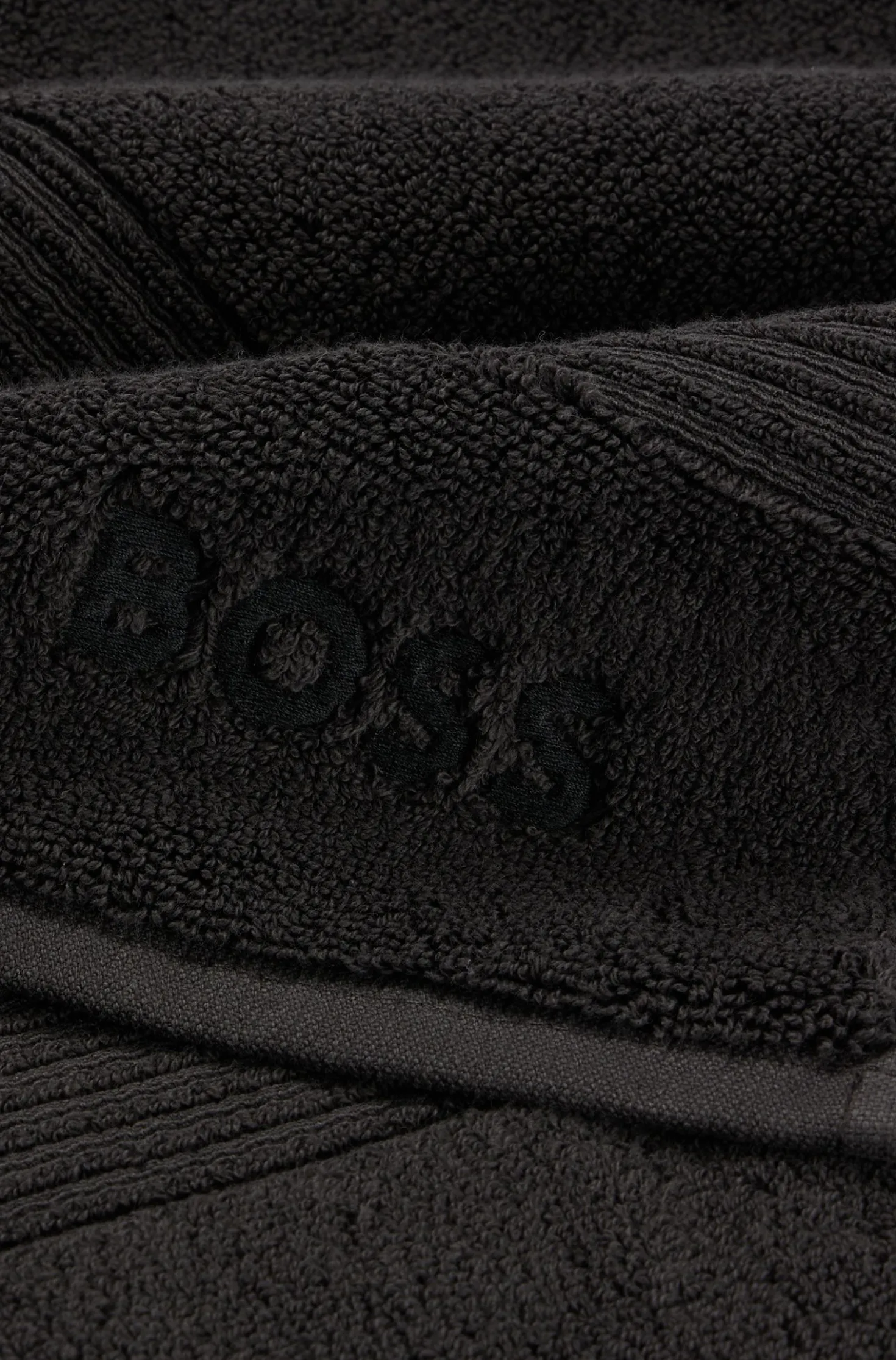 Black cotton bath towel with embroidered logo