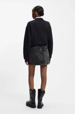 Black-denim skirt with asymmetric waistband