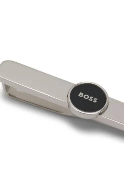 Brass tie clip with round logo detail