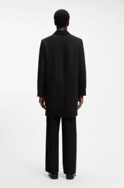 Buttoned coat in a virgin-wool blend