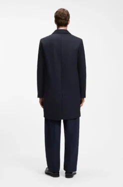 Buttoned coat in a virgin-wool blend