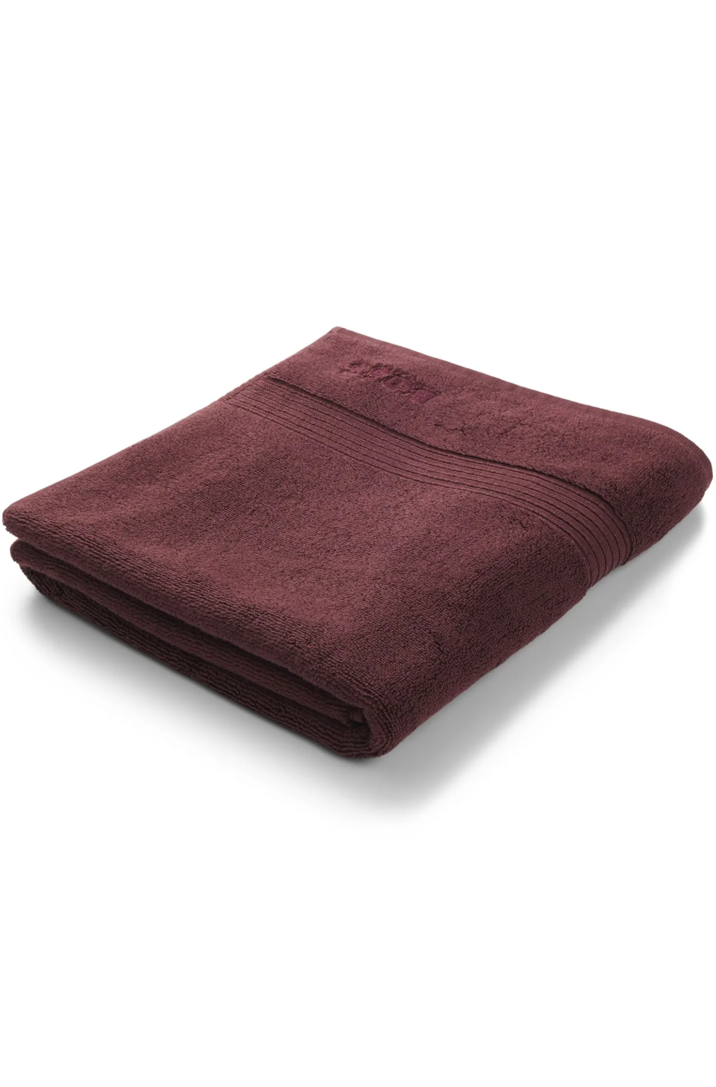 Cotton bath mat with embroidered logo