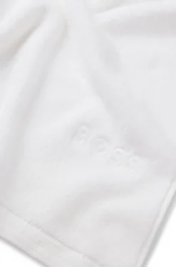 Cotton bath sheet with contrast embroidered logo