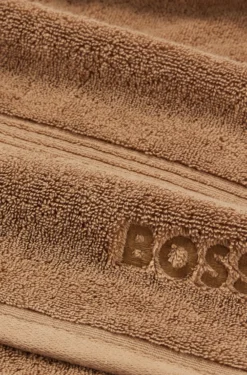 Cotton bath towel with tonal embroidered logo