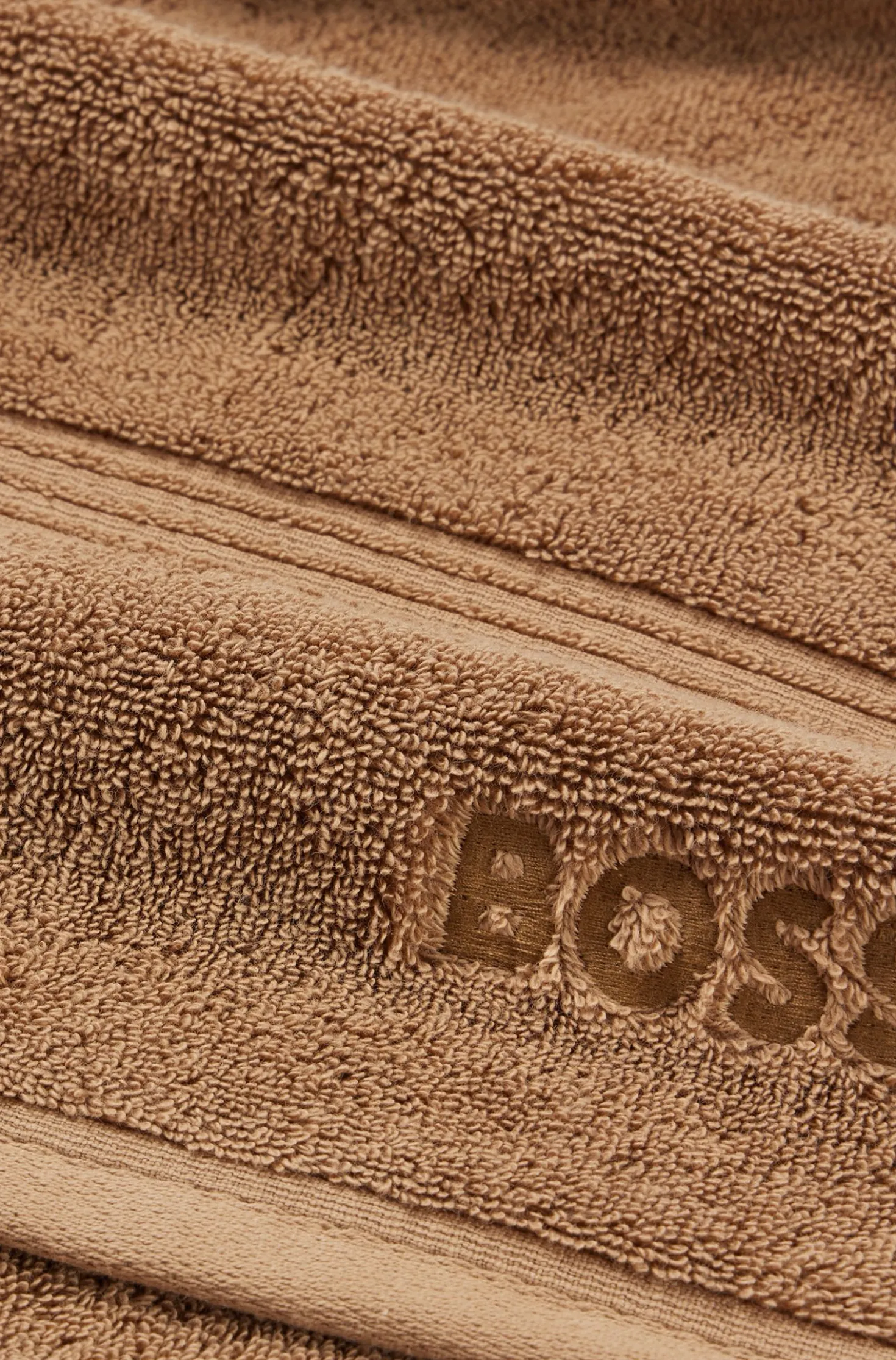 Cotton bath towel with tonal embroidered logo