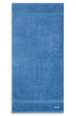 Cotton bath towel with tonal embroidered logo