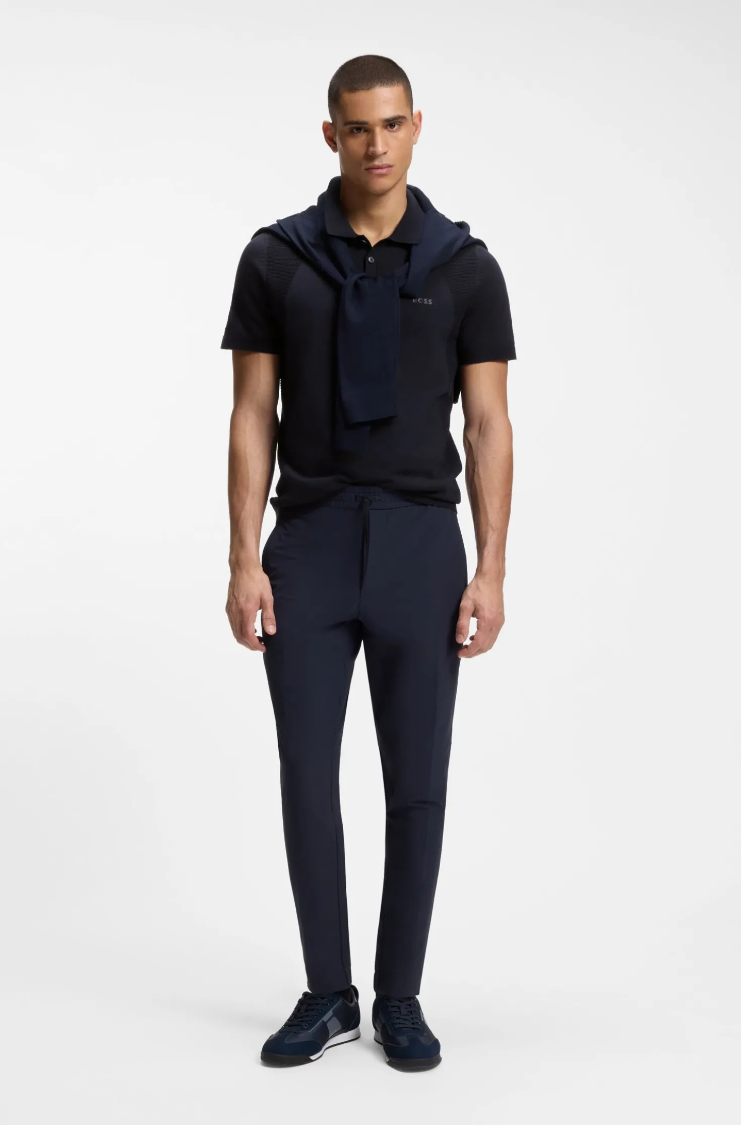 Cotton-blend knit polo with bodymapping structure