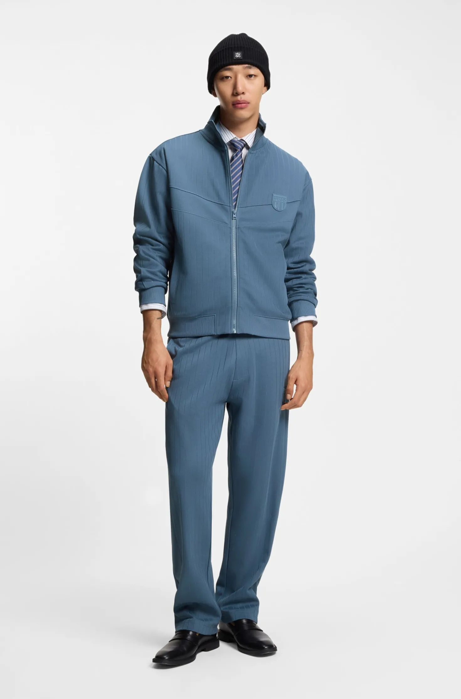 Cotton-blend tracksuit bottoms with drop-needle stripe