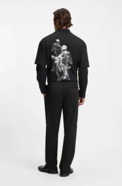 Cotton-blend tracksuit bottoms with drop-needle stripe