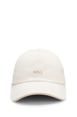 Cotton cap with metal logo lettering