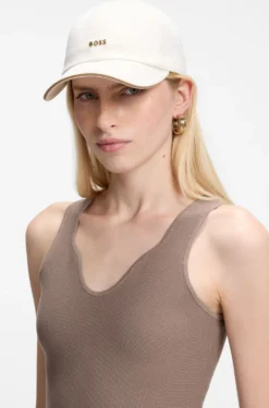 Cotton cap with metal logo lettering
