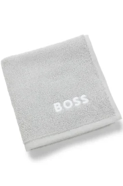 Cotton face cloth with contrast embroidered logo