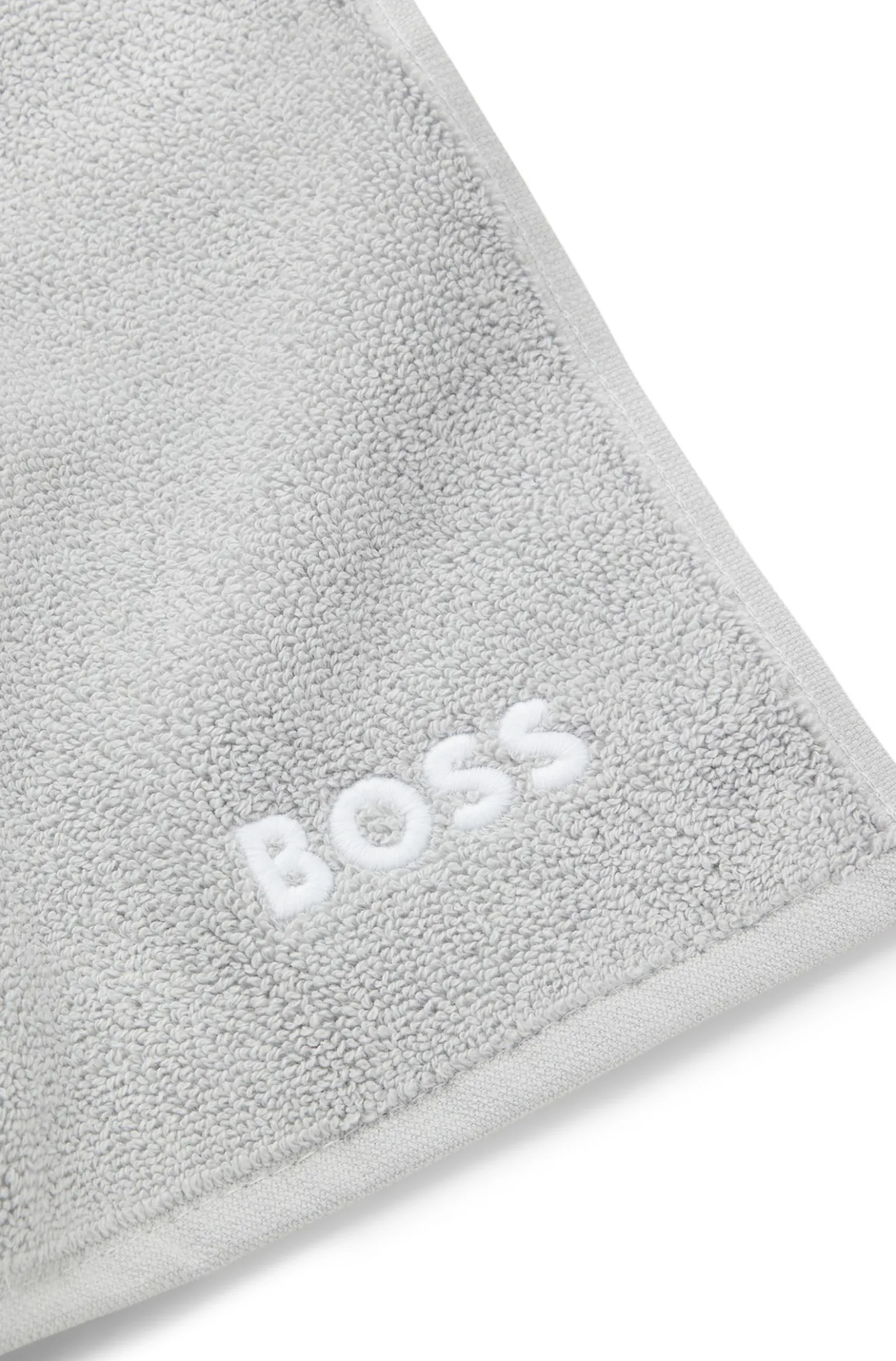 Cotton face cloth with contrast embroidered logo