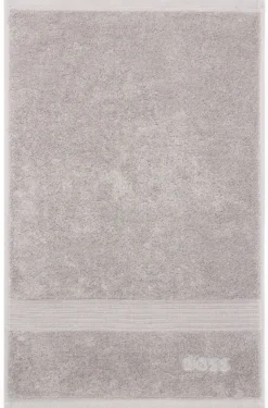 Cotton guest towel in silver with embroidered logo