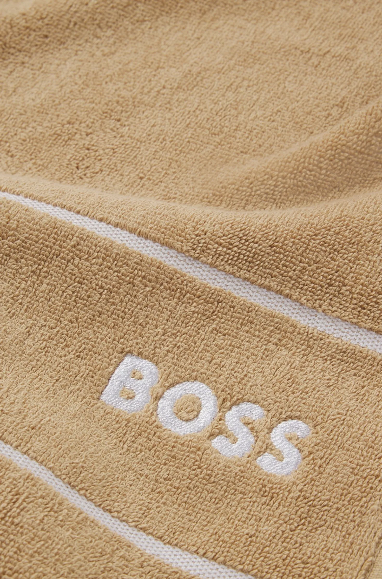 Cotton hand towel with white logo embroidery