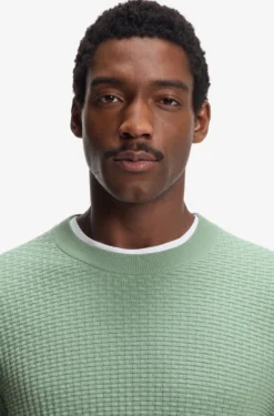 Cotton sweater with knitted structure