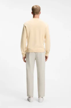 Cotton sweater with ribbed side seams