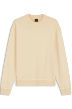 Cotton sweater with ribbed side seams