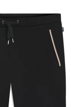 Cotton-terry tracksuit bottoms with signature stripes
