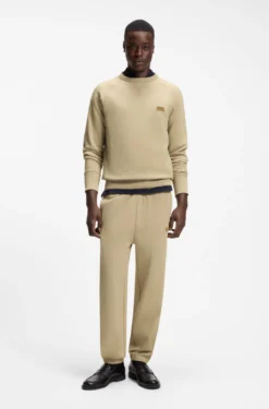Cotton-terry tracksuit bottoms with logo badge