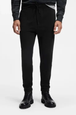 Cotton-terry tracksuit bottoms with logo patch