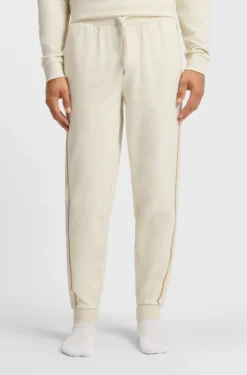 Cotton-terry tracksuit bottoms with tape and logo