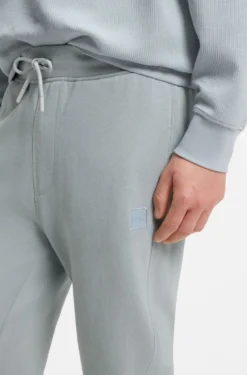 Cotton-terry tracksuit bottoms with logo patch