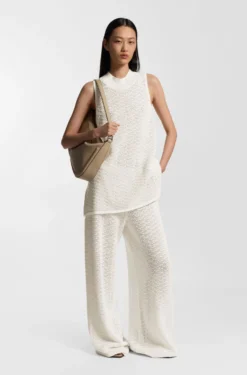 Cotton trousers with micro-lace structure