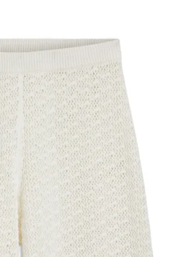 Cotton trousers with micro-lace structure