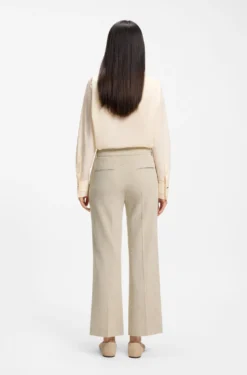 Cropped flared-fit trousers in a slub weave