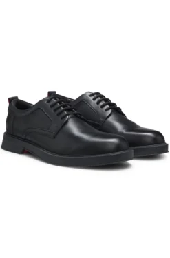 Derby shoes in leather with perforated monograms