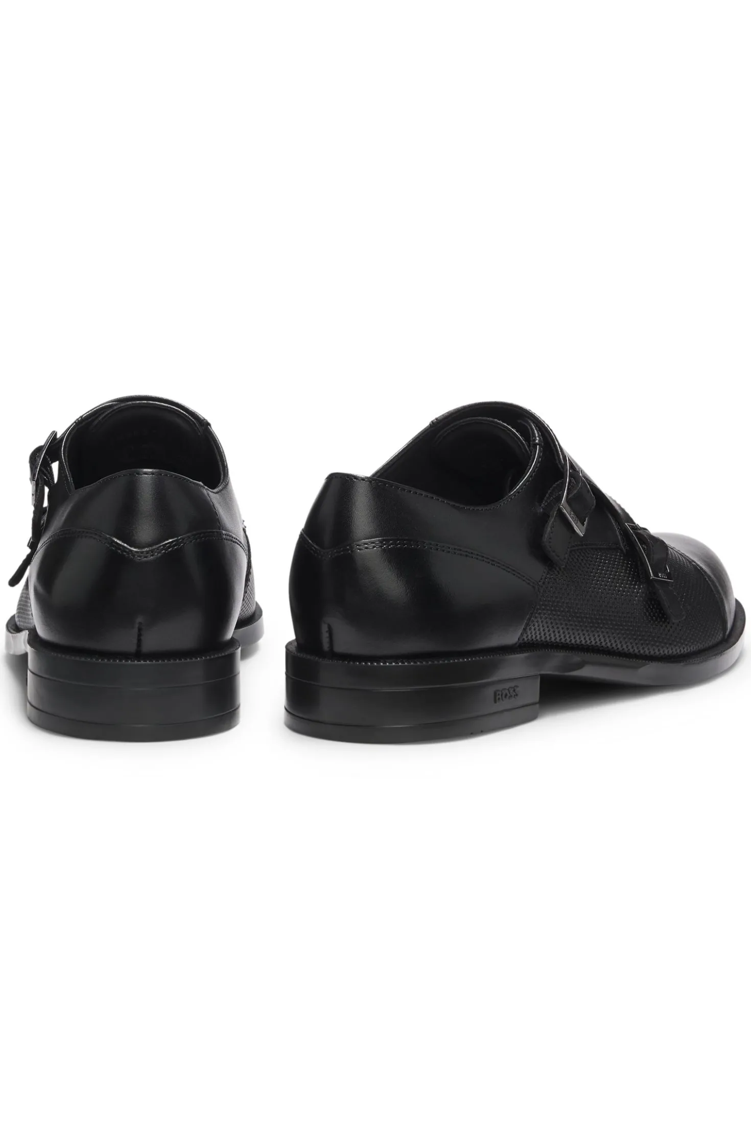 Double monk shoes in leather with perforated detail