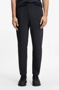 Drawstring trousers in stretch waffle fabric with framed zip