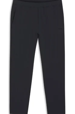 Drawstring trousers in stretch waffle fabric with framed zip