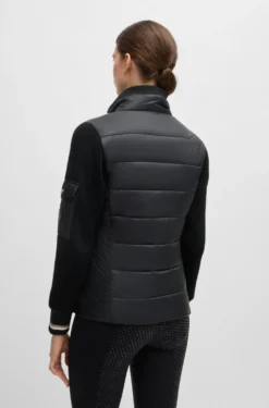 Equestrian mixed-material jacket with sleeve pocket