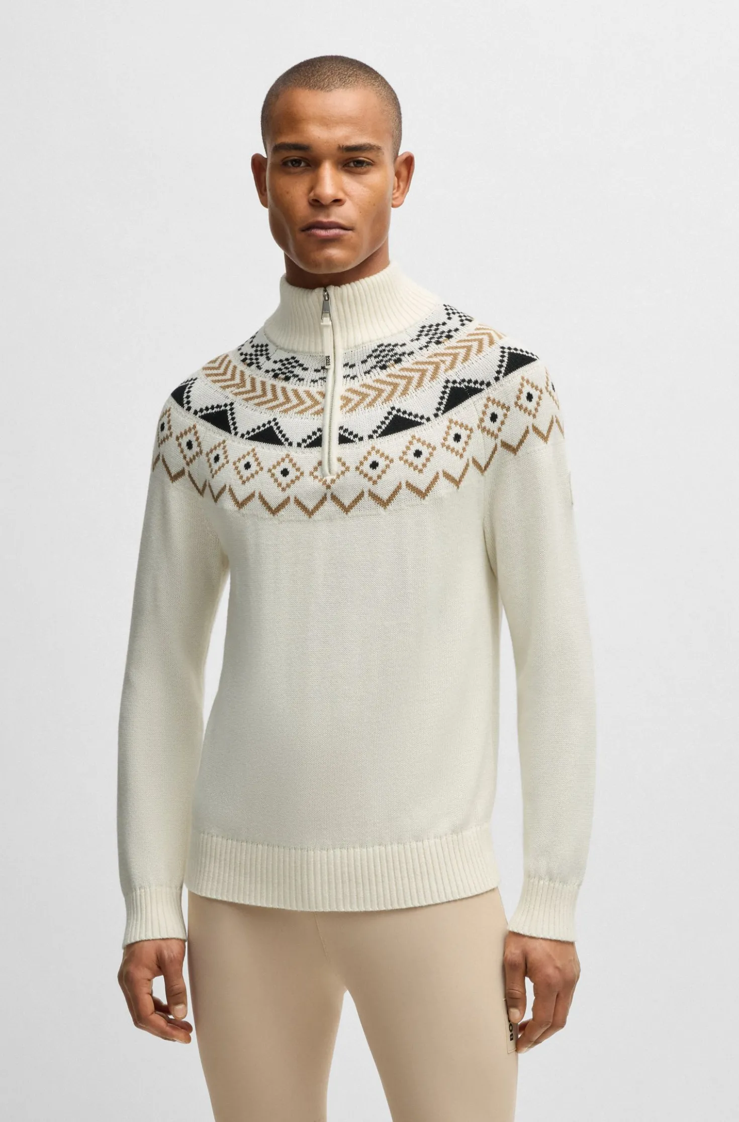 Equestrian troyer sweater with knitted pattern
