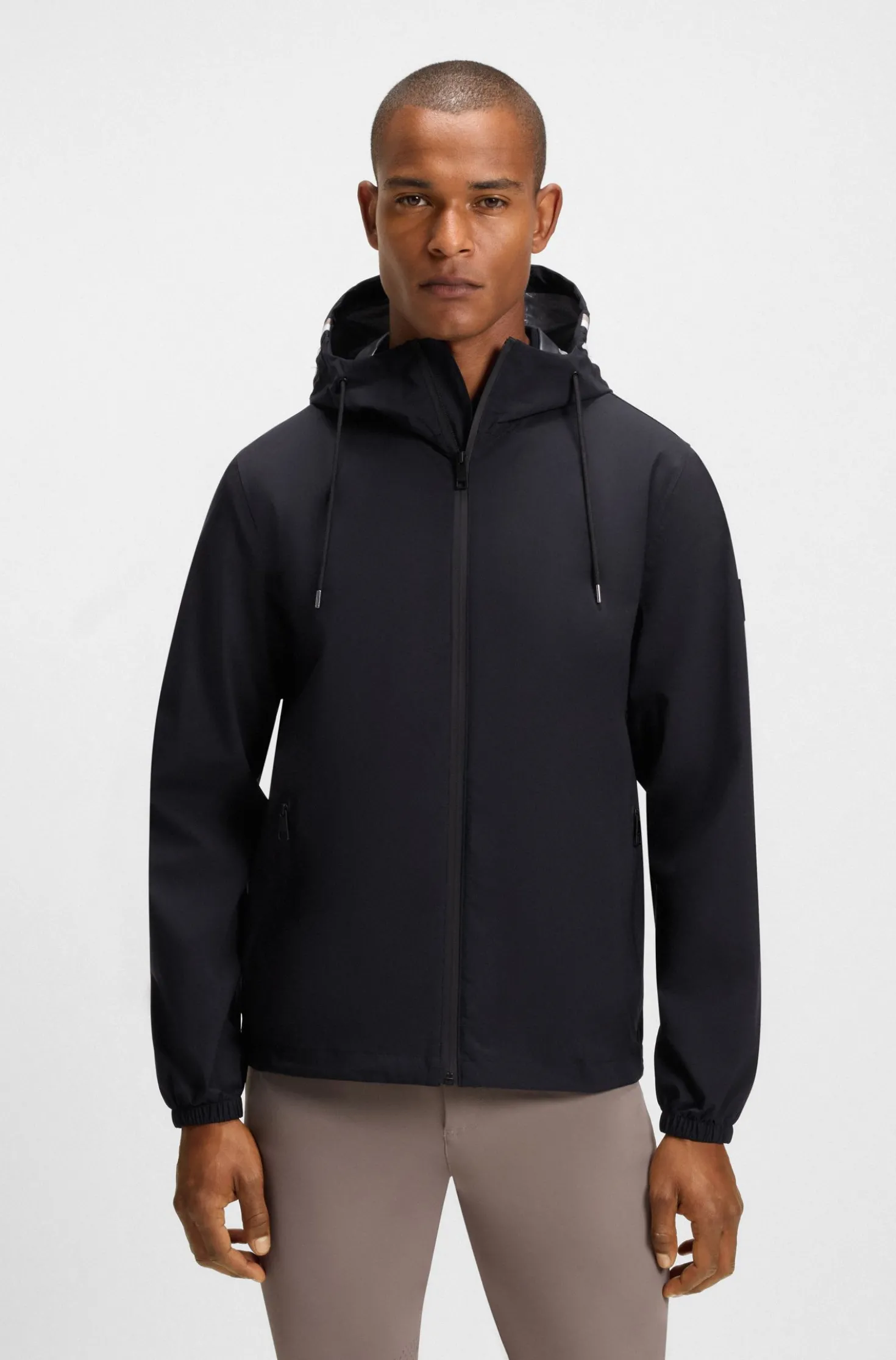 Equestrian waterproof jacket with adjustable hood