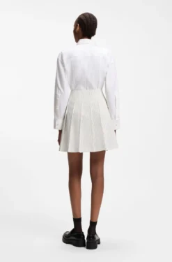 Faux-wrap mini skirt with pinstripe