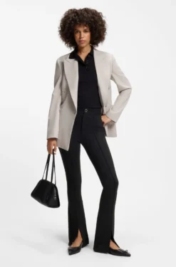 Flared-fit trousers with front slits