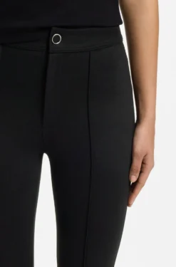 Flared-fit trousers with front slits