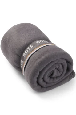 Fleece throw with signature-stripe ribbon