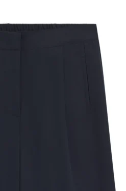 Formal trousers with pleat details