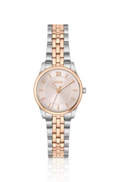 Graceful two-tone watch with pink sunburst-patterned dial